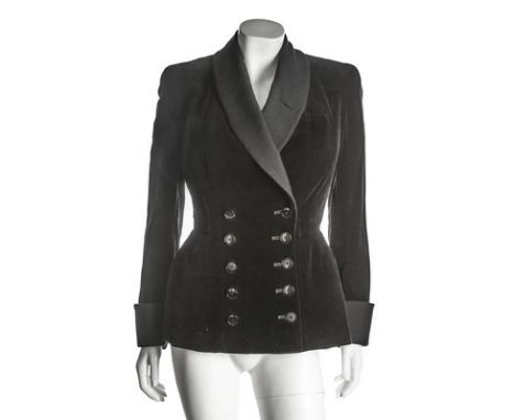 A Jacques Fath black velvet jacket, early 1950s, with 'Les Couturiers Associés Paris' label, double breasted button front and