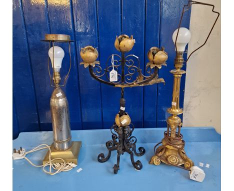 Gilt metal classical design table lamp with lion mask head mounts, together with another table lamp in the form of a WW shell