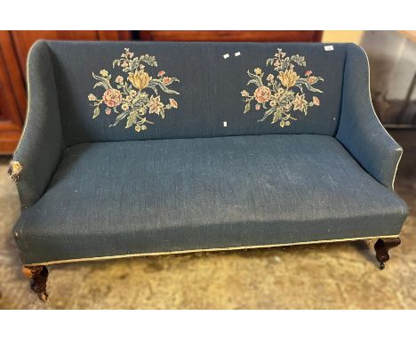 Early 20th century upholstered wing design two seater sofa with floral and foliate decoration. (B.P. 21% + VAT)Dimensions: 13