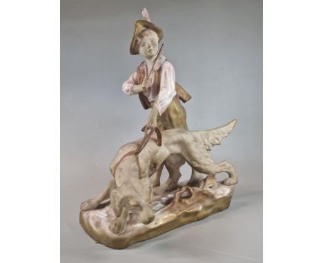Early 20th century Royal Dux figure group of young boy with hunting dog and lead, on naturalistic base. Shape No. 2867. 34cm 