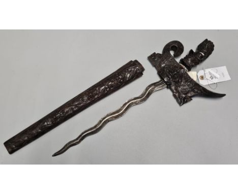 Probably late 19th/early 20th century Javanese/Balinese ceremonial Kris Dagger, having waved double edged steel blade, and he