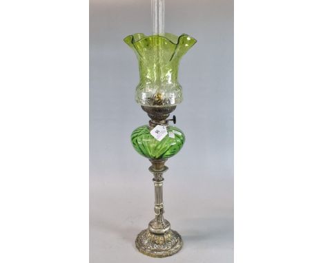 Art Nouveau design oil burner lamp, having green glass shade above a fluted green reservoir on Corinthian Column type base. (