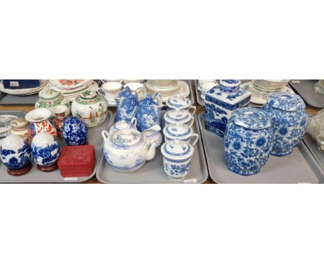 Three trays of ceramics to include: reproduction blue and white foliate jars and covers, Ringtons tea caddy, two early 20th c