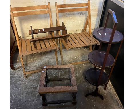 Group of assorted furnishing items to include: two folding cricket pavilion chairs, three tier folding cake stand, stool with
