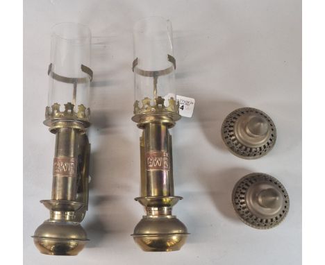 Pair of brass carriage lamps with glass chimneys, the bronze plaques marked GWR. (2)  (B.P. 21% + VAT)