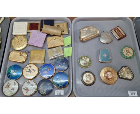 Two trays of vintage compacts, bird, portrait and other designs, many by Stratton, together with one in the form of a purse a