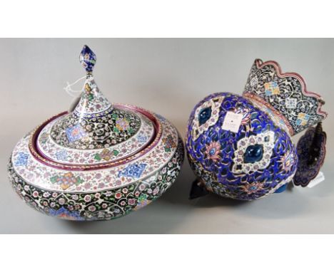 Two Persian style polychrome enamelled items comprising a lidded bowl (24cm diameter approx.) together with an enamel and gla