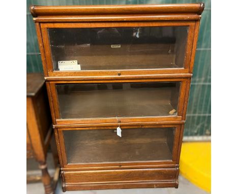 Early 20th century mahogany Globe Wernicke three sectional bookcase, with metal banding. 87x31x126cm approx. (B.P. 21% + VAT)