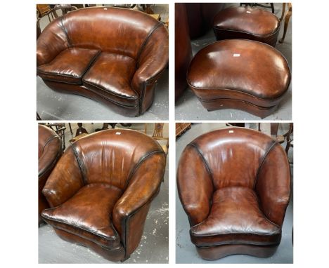 Art Deco style tan leather kidney shaped three piece suite comprising: two seater sofa and pair of armchairs, together with a