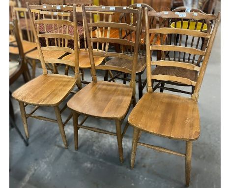 Group of three matching beech framed Ensign ladder backed dining chairs, by Bristow &amp; Townsend Ltd of High Wycombe. (3) (