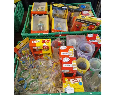 Two boxes of The Simpsons items to include: beer glasses, other drinking glasses, wine stoppers and cork screws including Gra