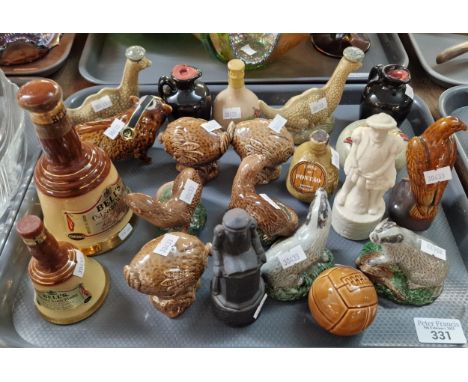 Tray of novelty ceramic/porcelain decanters in the form of animals including: the Loch Ness Monster, badgers, otters, eagles 