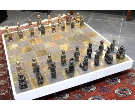 unique late 20th Cent. Belgian chessgame with pieces in glazed ceramic and with its matching table with ceramic tiles by Elly