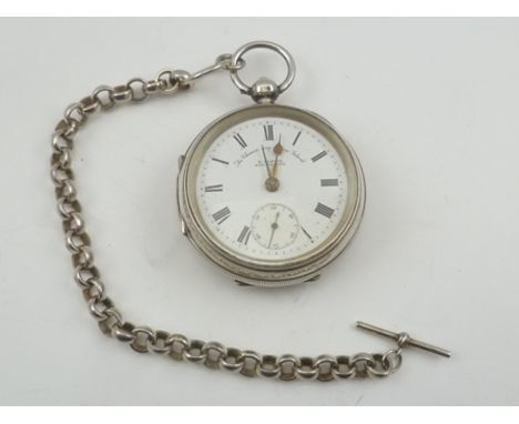 A LARGE EDWARDIAN SILVER POCKET WATCH AND CHAIN, the case Chester 1904 