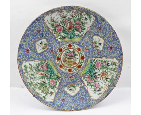 A LATE 19TH/EARLY 20TH CENTURY CHINESE CANTON EXPORT PORCELAIN CHARGER, decorated in polychrome with vignettes of flora and b