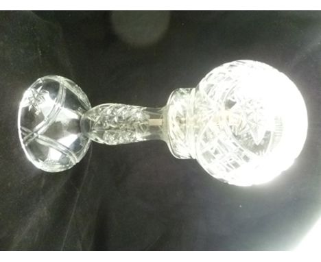 A 20TH CENTURY CUT GLASS TABLE LAMP of lace makers design, having globe shade, upon a baluster stem with domed base, 38cm hig