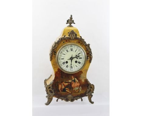 A LOUIS XV STYLE MANTEL CLOCK, VERNIS MARTIN type decoration, depicts a young couple in 18th Century costume with a dog in a 