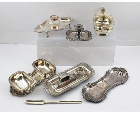 A SELECTION OF SILVER PLATED ITEMS to include; an Old Sheffield plate inkwell desk stand, a snuffer tray, pressed chamber sti