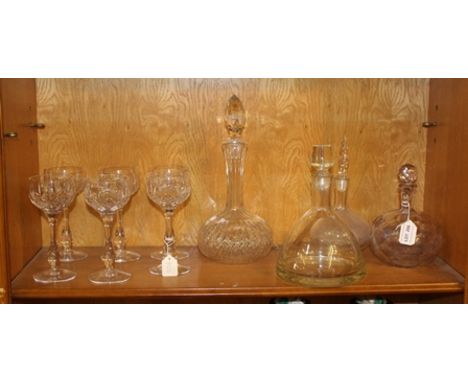 A SUITE OF SIX CUT GLASS HOCK GLASSES, together with a cut glass SHERRY DECANTER, a heavy cut glass SPIRIT DECANTER, an etche