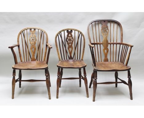 A PART 19TH CENTURY HARLEQUIN SET OF SIX COUNTRY HOOP, STICK AND WHEEL BACKED CHAIRS, one with central bull's eye, of typical