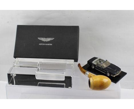 AN "ASTON MARTIN" PRESENTATION GLASS ASHTRAY in original card box, 19cm x 19cm, together with a "Peterson Dublin" MEERSCHAUM 