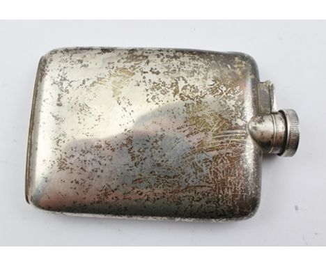 MARK OBSCURED A 1920's RECTANGULAR SILVER SPIRIT FLASK having knurled screw cap and un-engraved plain belly, possibly Birming