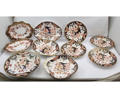 A QUANTITY OF ROYAL CROWN DERBY IMARI PATTERNED PORCELAIN, includes a set of four 22cm plates, a single handled serving bowl,