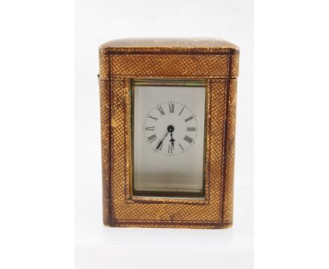 AN EARLY 20TH CENTURY FRENCH BRASS CARRIAGE TIME PIECE having moulded style case with period enamel inset decoration, eight d