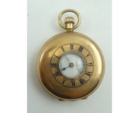 THOMAS RUSSELL & SON, LIVERPOOL A 9CT GOLD DEMI-HUNTER POCKET WATCH, having calibrated cover, Swiss 15-jewel lever mechanism 