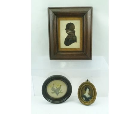 AN OVAL MINIATURE PORTRAIT of a Regency lady, gilt framed, 7cm x 5cm, together with a small WATERCOLOUR PAINTING "Primroses",