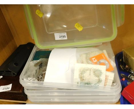 A quantity of coins, a banknote, two ten shilling notes, a pound note, etc. 