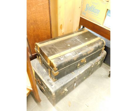 A tin trunk and another.