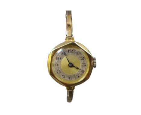 A 9ct yellow gold ladies bracelet wristwatch, manual wind 23mm case on a stung strap, 18.0g, currently running.