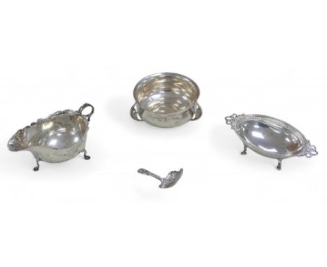Four pieces of George III and later silver, including a George III caddy spoon, John Bettridge, Birmingham 1820, 7cm long, to