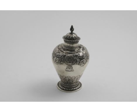 AN 18TH CENTURY DUTCH TEA CADDY Vase-shaped with a pull-off cover, decorated around the upper body with formal embossing &amp