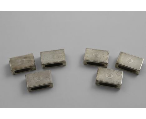 A SET OF SIX EARLY 20TH CENTURY MATCH BOX COVERS with engine-turned decoration, crested, maker's mark "TF&amp;Co", London 192