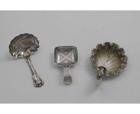 A VICTORIAN CADDY SPOON with a gilt, matted shell bowl and a hollow crescent, by George Unite, Birmingham 1872 and two other 