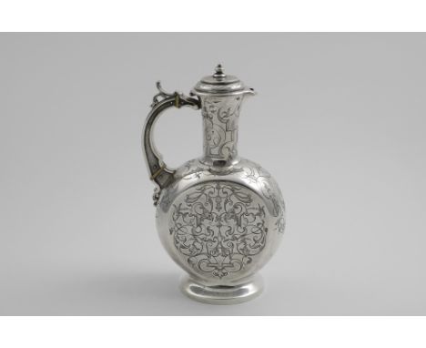 AN EARLY VICTORIAN HOT WATER JUG in the form of a moon flask with engraved decoration, a plain circular foot and a hinged cov