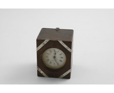 A LATE VICTORIAN MOUNTED LEATHER TIMEPIECE fitted with a nickel-plated movement by the British United Clock Co.Ltd., the moun