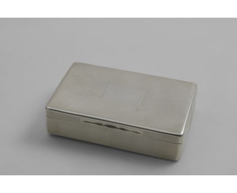 A VICTORIAN LARGE RECTANGULAR SNUFF BOX with rounded corners, engine-turned decoration and a vacant cartouche on the cover, g