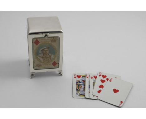 AN EDWARDIAN RECTANGULAR PLAYING CARDS BOX with a low-domed cover, set with four bevelled glass panels, each with a playing c