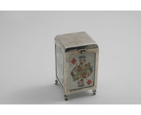 A LATE VICTORIAN PLAYING CARDS BOX on four pierced feet with four bevelled glass panels, each inset with a playing card, dome