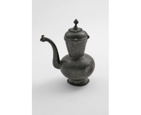 A RARE INDIAN MUGHAL NIELLOWORK EWER decorated all over with engraved arabeque friezes of alternating flowerheads and stylise