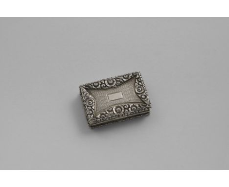 A WILLIAM IV RECTANGULAR VINAIGRETTE with engine-turning and raised floral borders around the base and cover, vacant cartouch