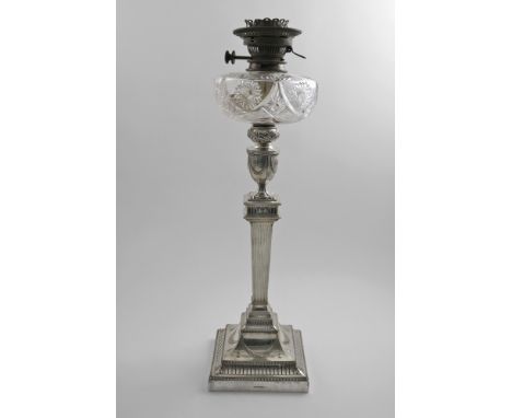 A LATE VICTORIAN ELECTROPLATED LAMP in the form of a large Neo-classical candlestick with a fluted square column, stepped squ
