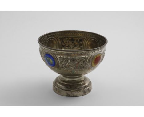 AN EDWARDIAN ROSE BOWL with repousse-work panels of Art Nouveau flowers alternating with coloured enamel roundels, and furthe