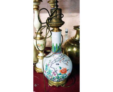 A large Chinese style bottle vase lamp with gilt metal mounts