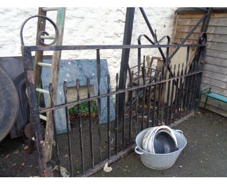 A pair of heavy ornate wrought iron entrance gates - to fit approx. 4.10m including hangers - sold with a garden gate to fit 
