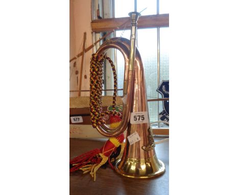 A reproduction copper bugle