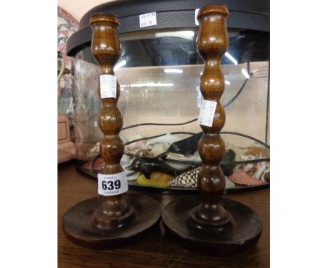 A pair of bobbin turned wooden dressing table candlesticks